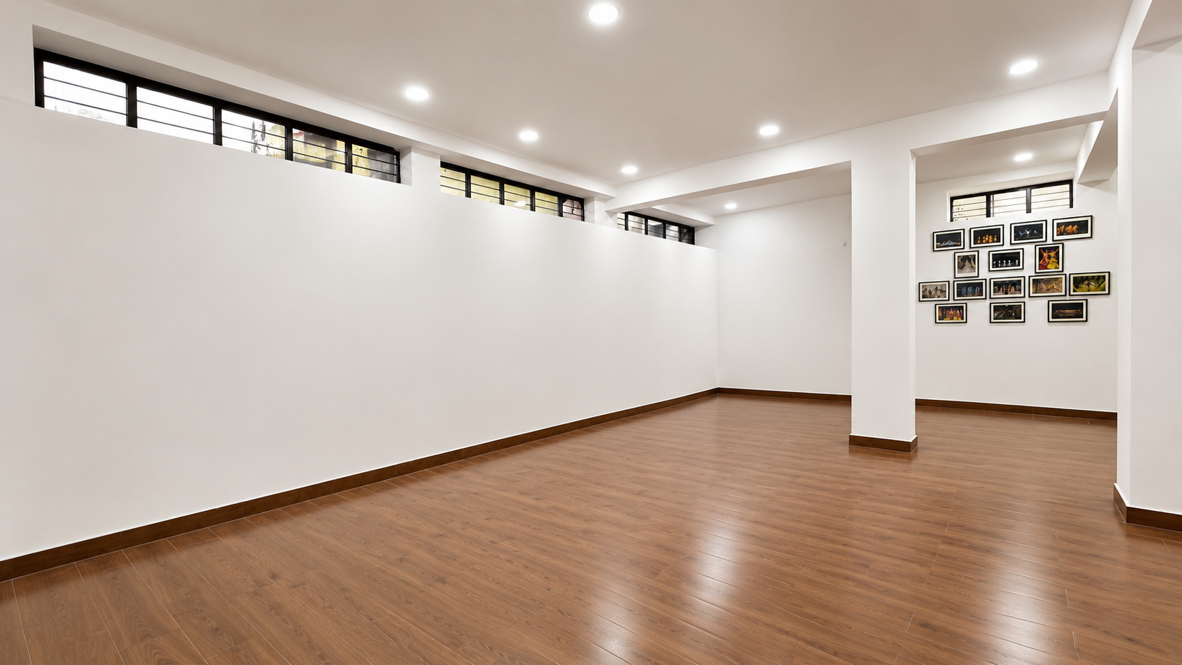 The Fankaar practice room — wood floor, clerestory windows along one wall